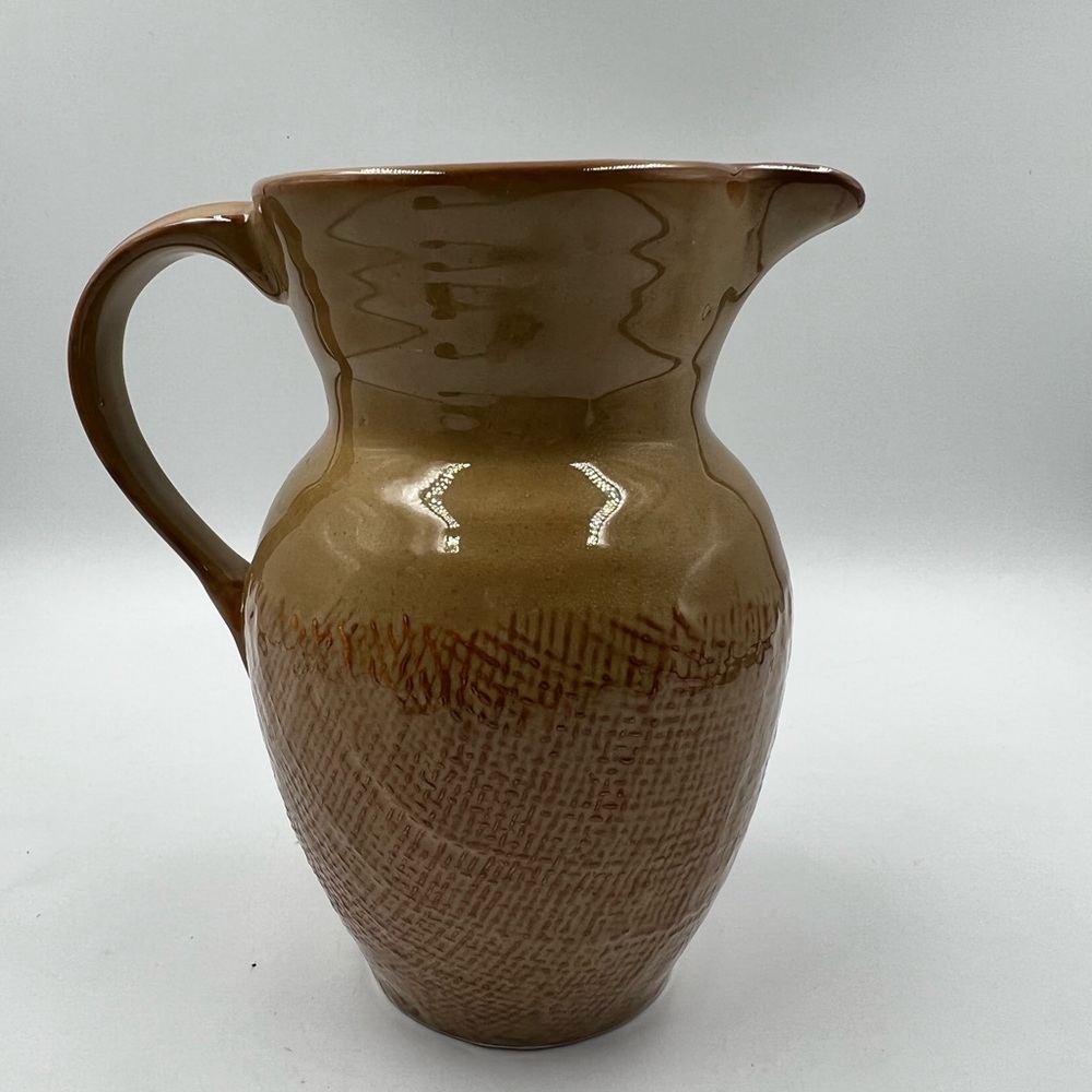 Craft pottery pitcher.